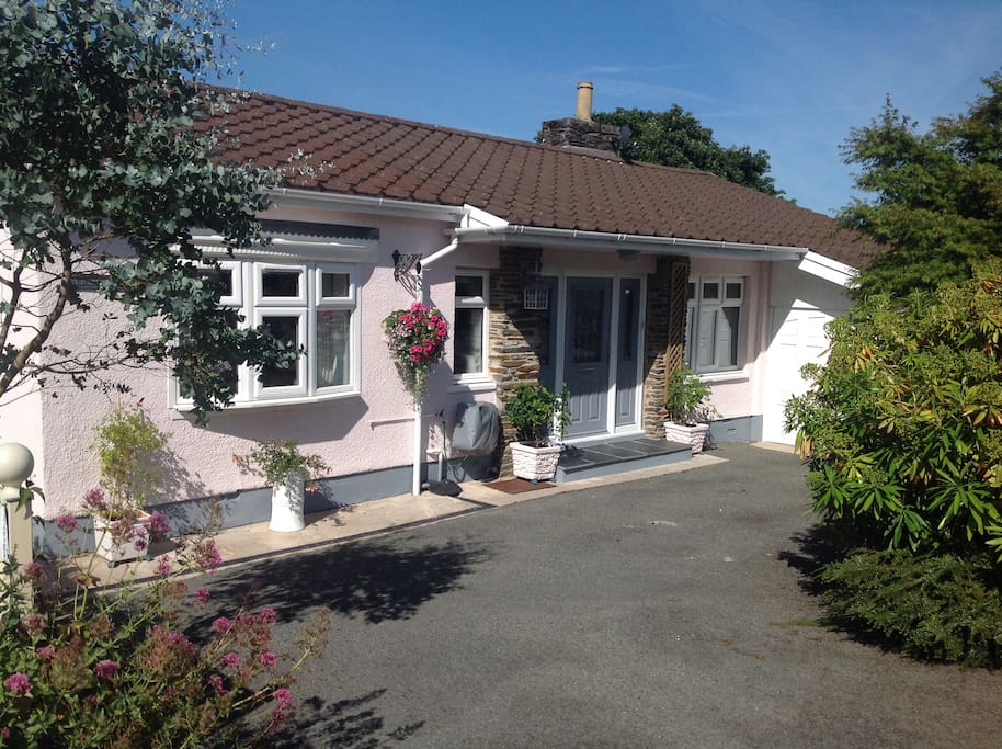 Pretty in pink! Immaculate bungalow with plenty of off street parking for visitors