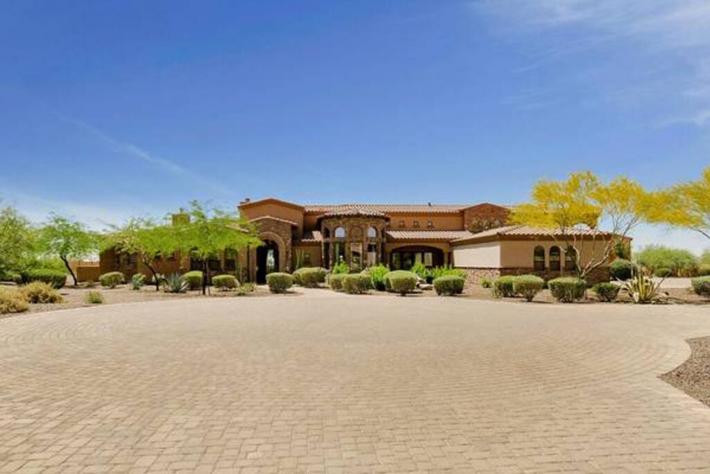 Almost 2,000 feet of six foot wall encloses this 4½ ACRE compound.