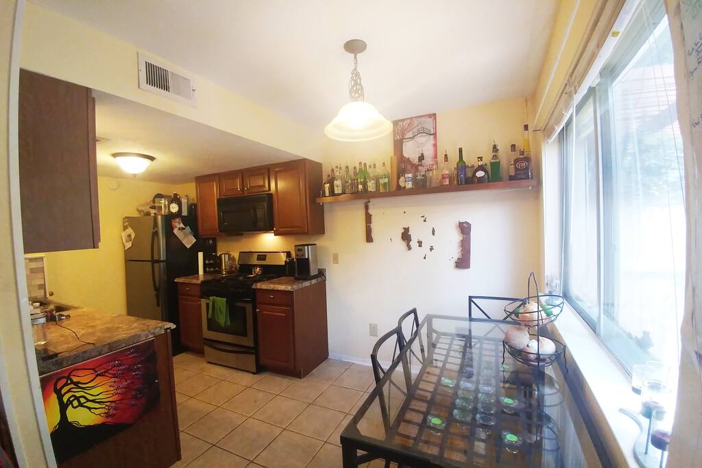 Kitchen-den w/bar...maybe