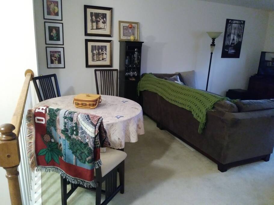Dining table invites guests to relax, work, eat, etc...