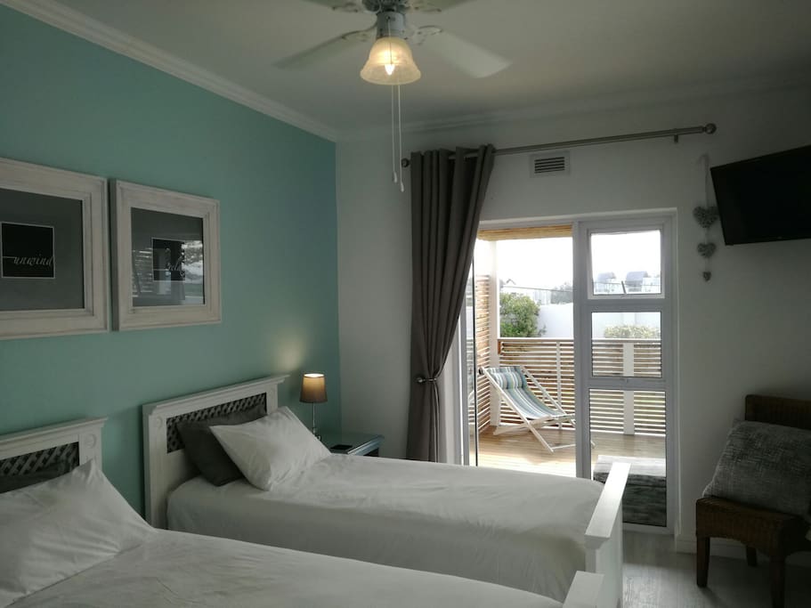 The bedroom with ensuite bathroom