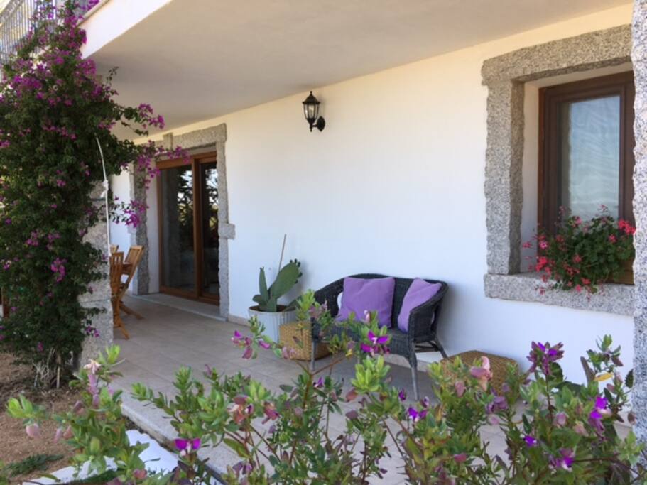 The panoramic veranda of the big apartment with a unique view of the hills, the sea and Tavolara Island.