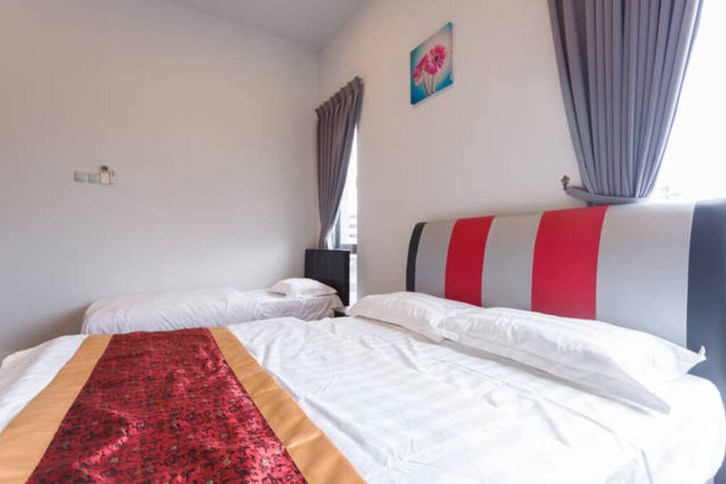 Master bedroom. 1 double bed and 1 single bed with Air-conditioner. Occupied with own washroom