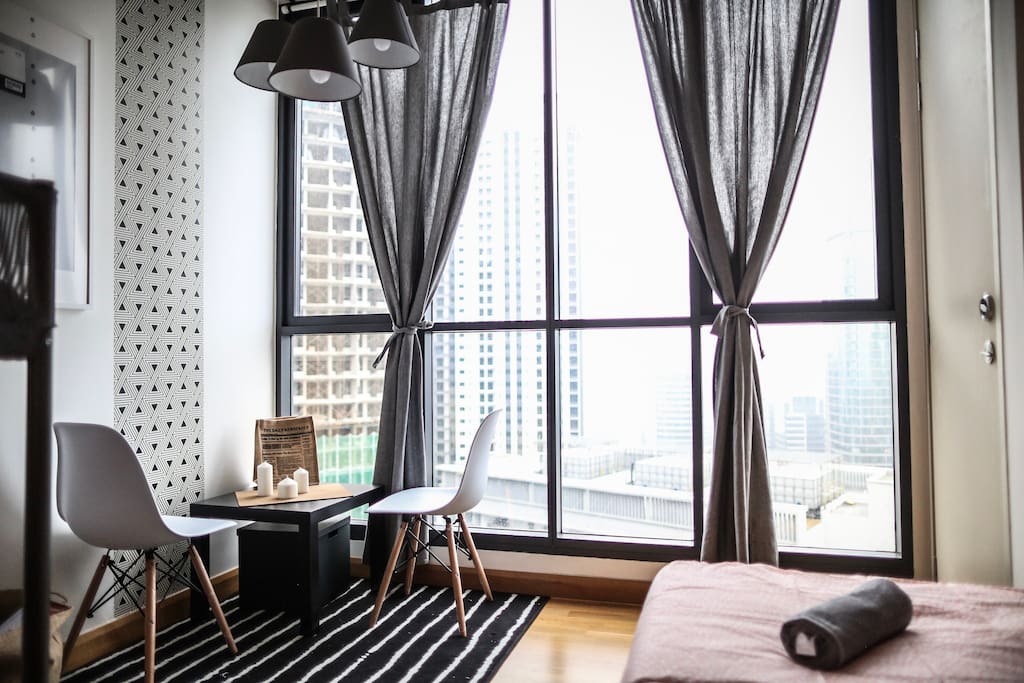 A mini-resting area in the bedroom.