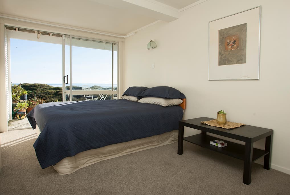 Queen bedroom with sea views