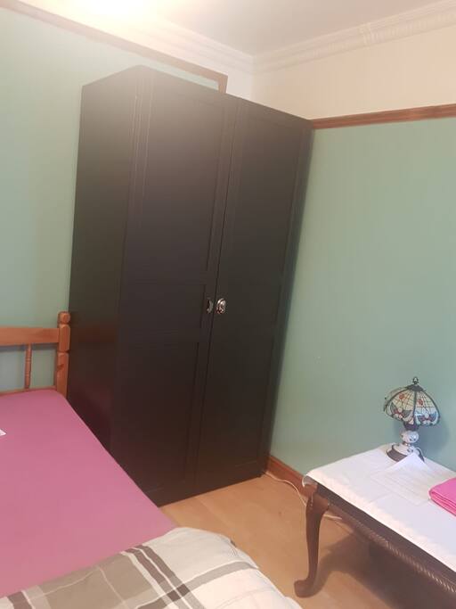 Cupboard with hangers provided
