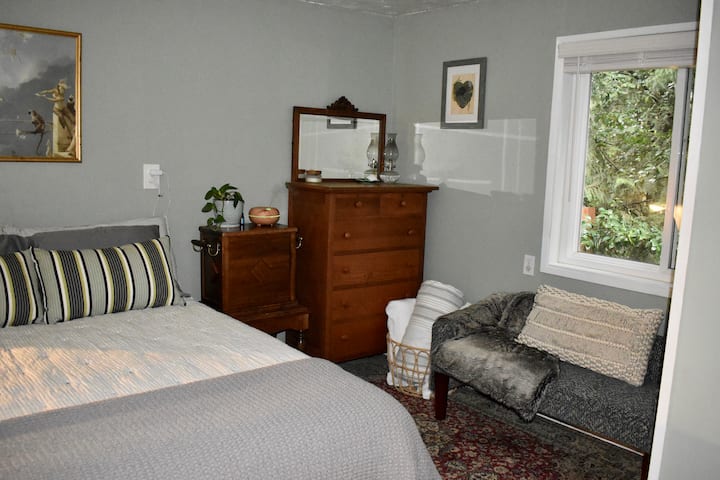 New mattress and clean comfy bedding make this bedroom relaxing. There are also adult coloring books to help you de-stress in the country but close in.