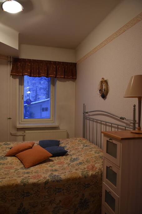 Bedroom with double bed and closets