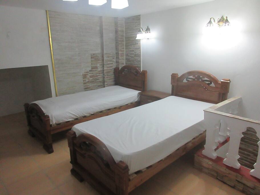 2 Camas personales en Habitacion con Capacidad para 4 personas
