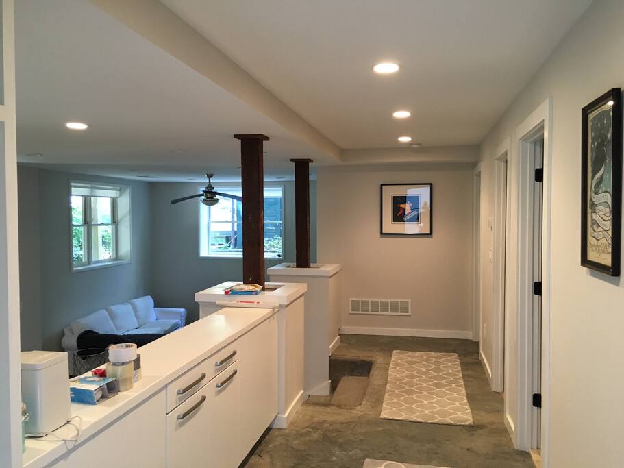 Foyer that leads living room, full size kitchen, bedrooms and bathroom