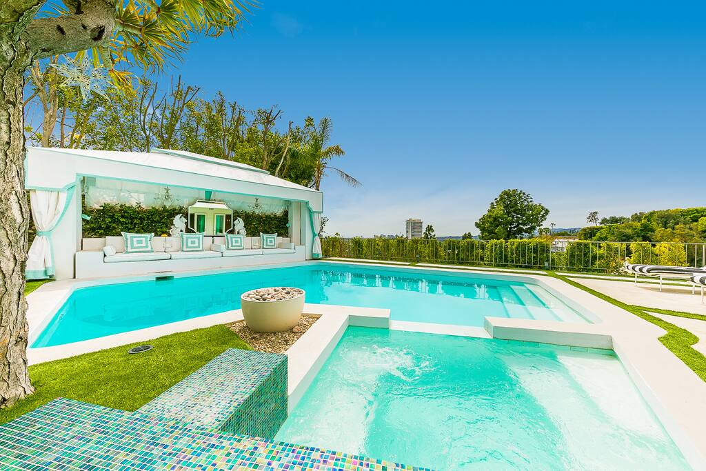 Soak in the hot tub or pool with amazing views of century city's skyline in the background.