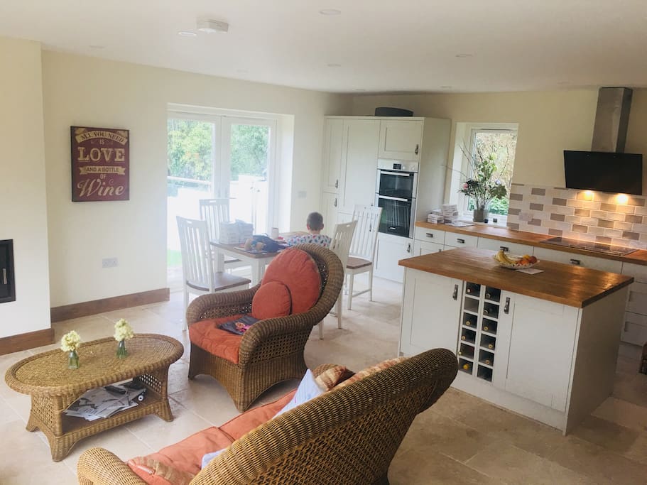 Living area and open plan kitchen