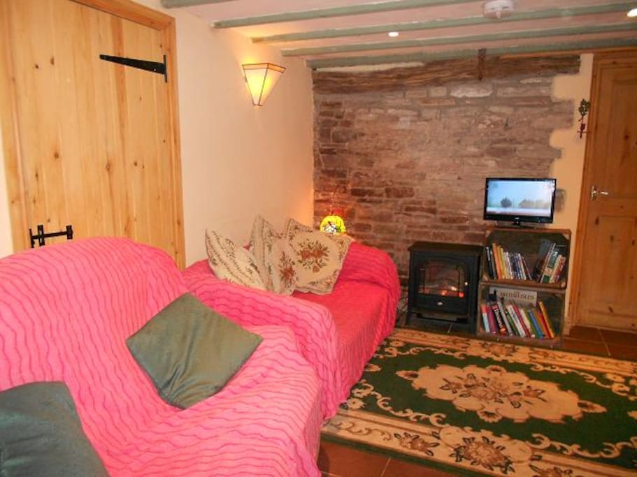 Cosy sitting room with double sofa bed