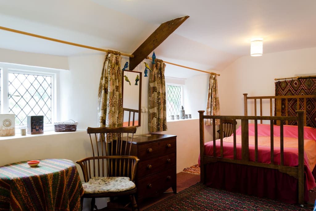Double room with views onto green fields.