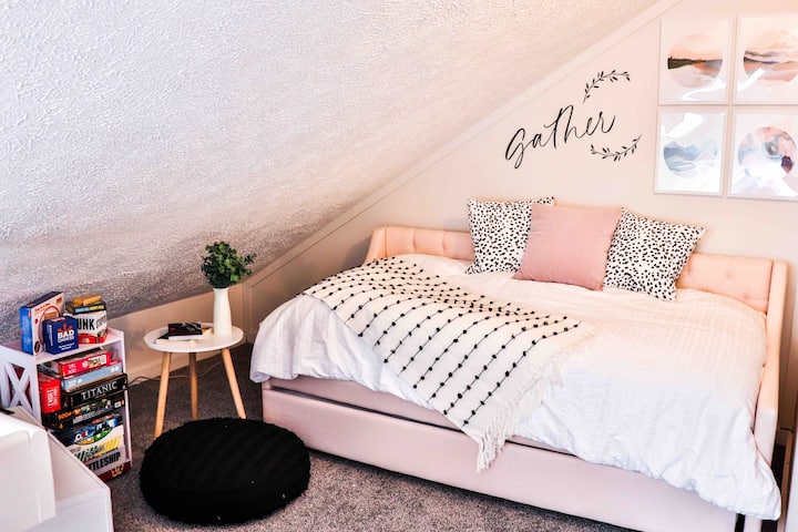 Upstairs Loft • Two couches are in this area • Trundle Pink Bed turns into two twin beds  • Blue couch turns into a small bed • Privacy screen available for privacy • 32 inches smart tv with complimentary Netflix/Hulu/Disney+/ESPN+
