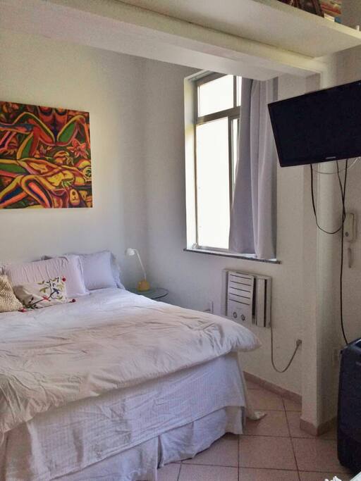Bed, window & TV