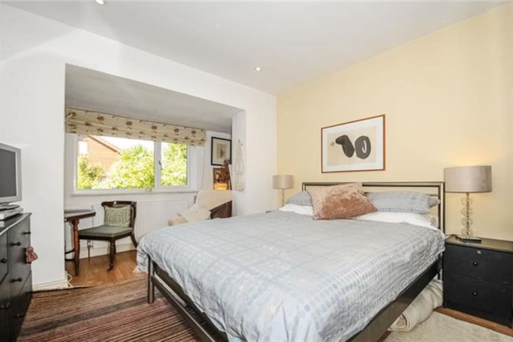 Double bedroom, view over garden private bathroom