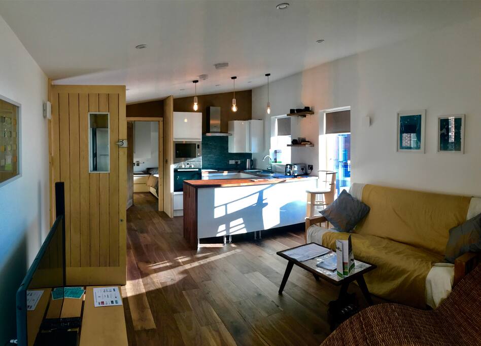 Stunning interior with walnut flooring throughout, clay plastered walls and triple glazing, means you are cocooned from the rest of the world.