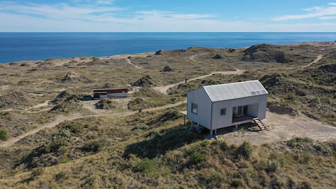 Popular Airbnb listing: House with an ocean view in Faro Belén in Departamento Adolfo Alsina