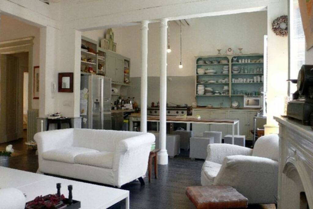 the kitchen and part of the living room.