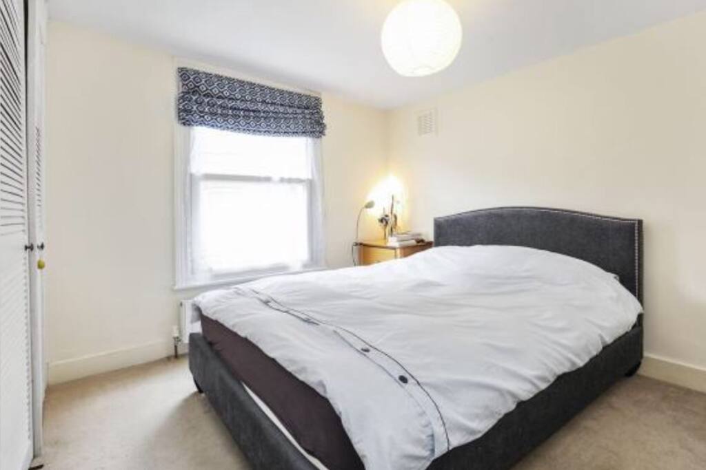 Bedroom with King size bed and wardrobe
