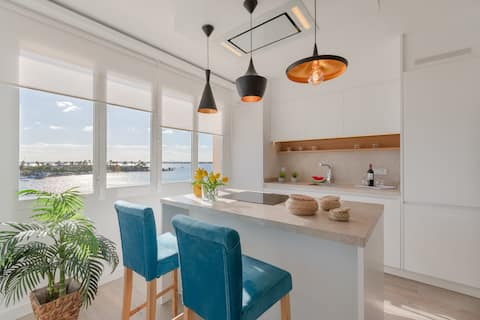 First Line: Modern apartment with great views!