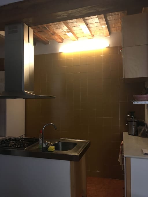 Small but cute kitchen attached to living room