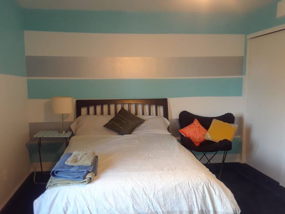 Room with full-size bed