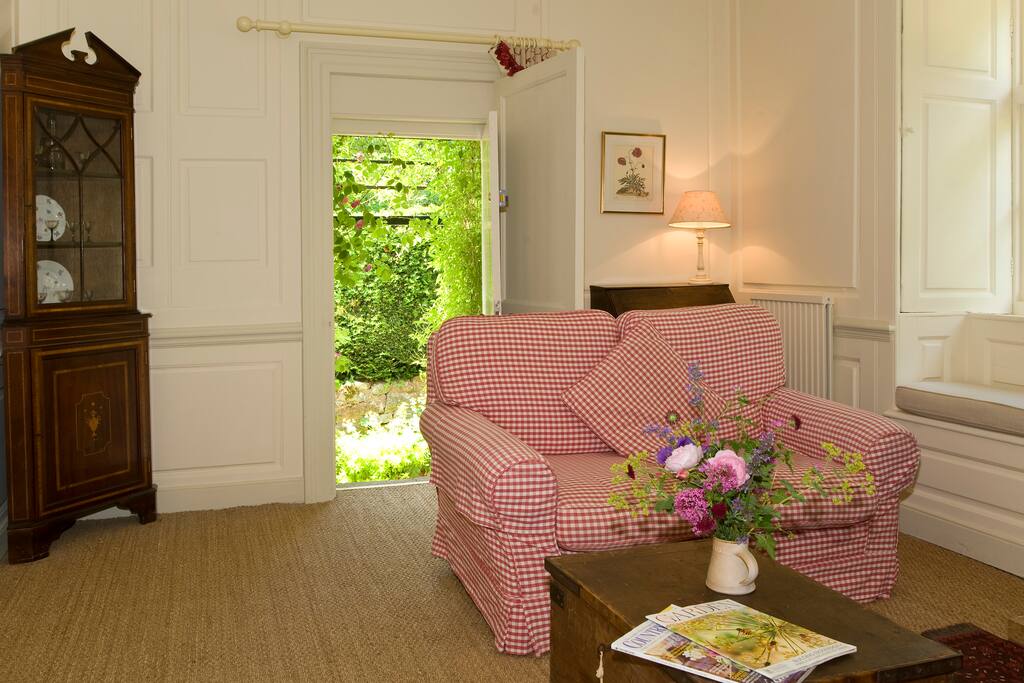 Sitting room with garden door and woodburning stove