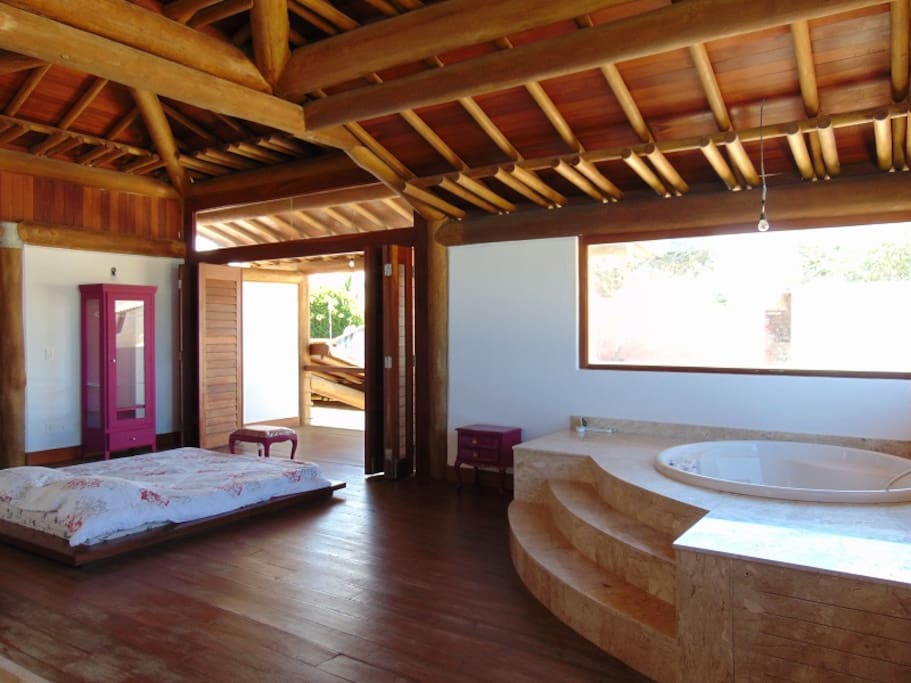Master bedroom with jacuzzi, air conditioning and balcony