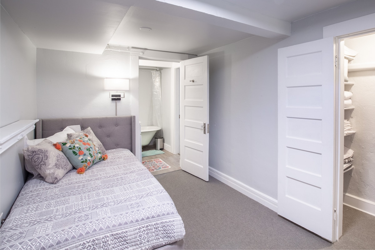 Twin XL bed w/ TV and desk