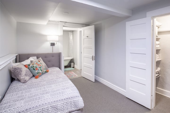 Twin XL bed w/ TV and desk