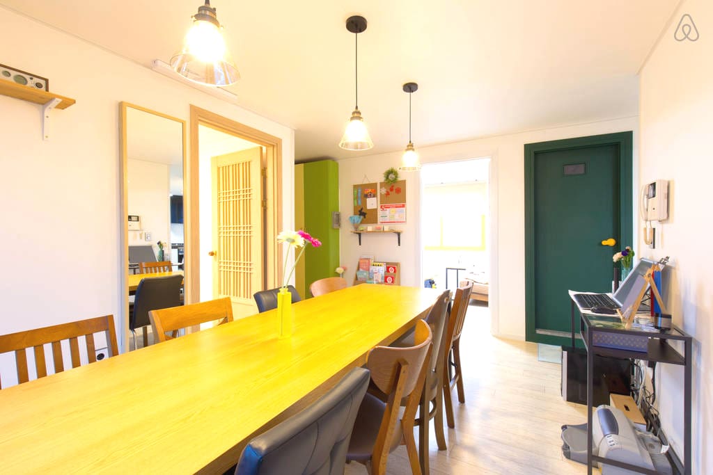 Spacious living room with a conference table