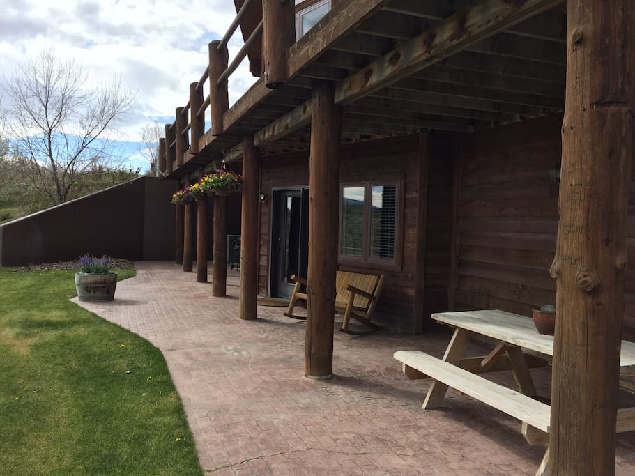 Private patio with grill and picnic table to enjoy outdoor meals together.