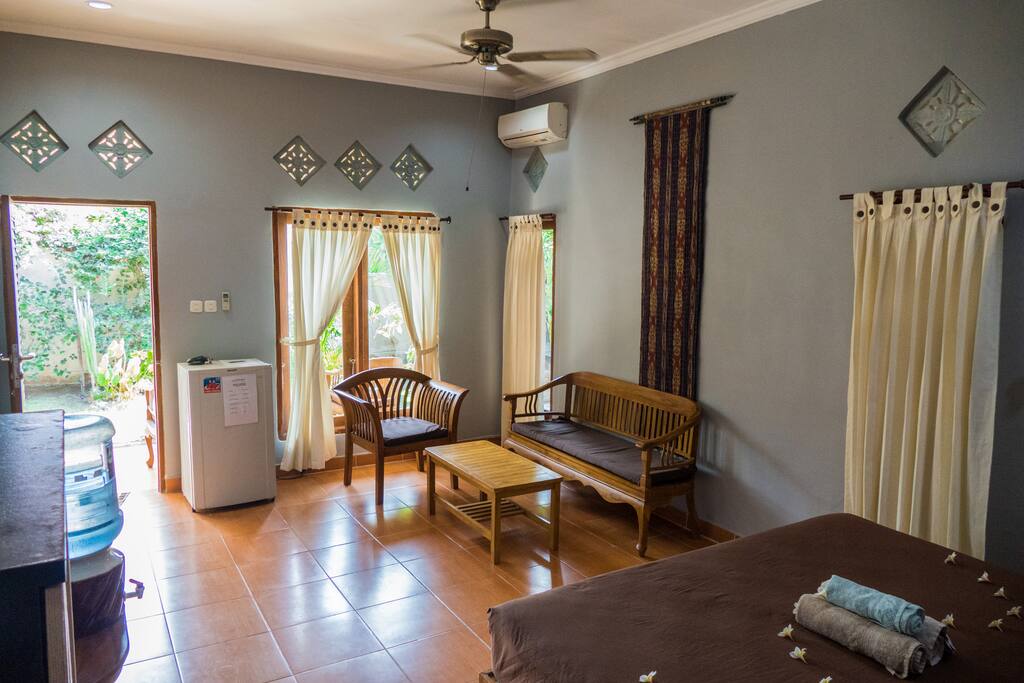 Spacious and bright bedroom with sitting area