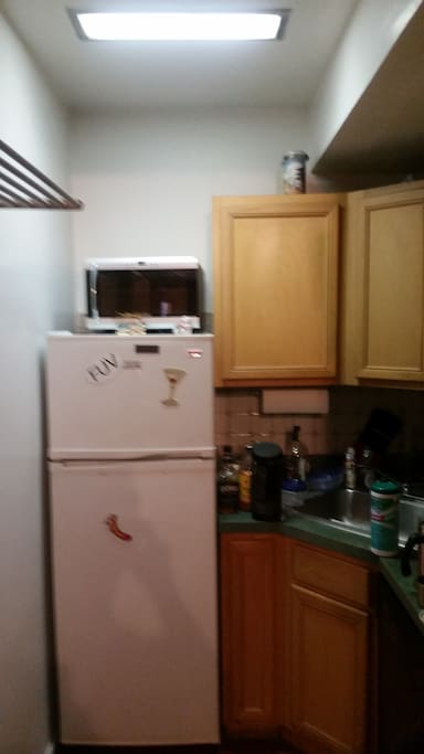 A kitchen! With a refrigerator and everything.