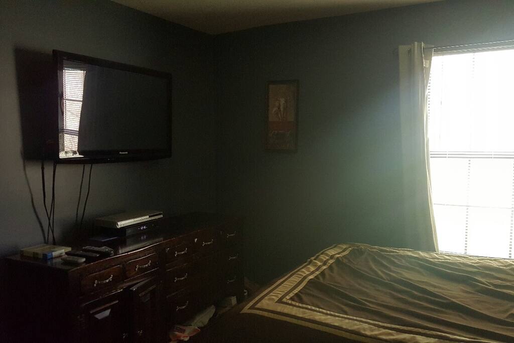 Flatscreen in bedroom.