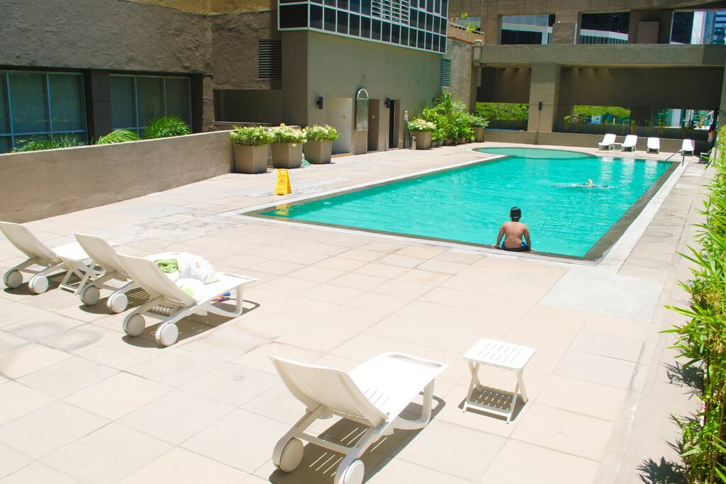 Outdoor pool with sun-beds