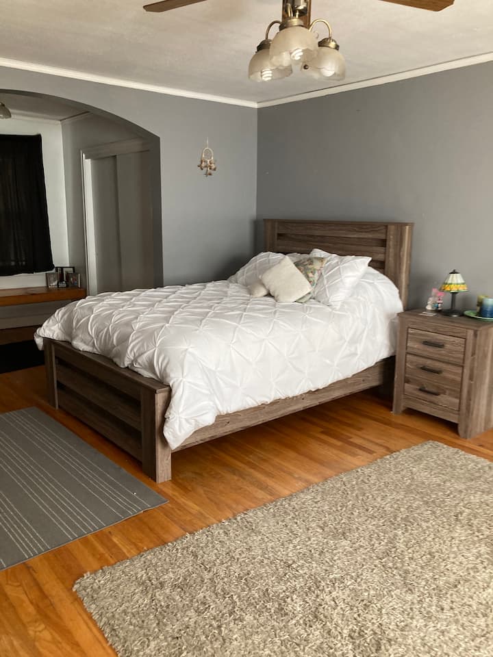 Bedroom with full size bed. Upstairs