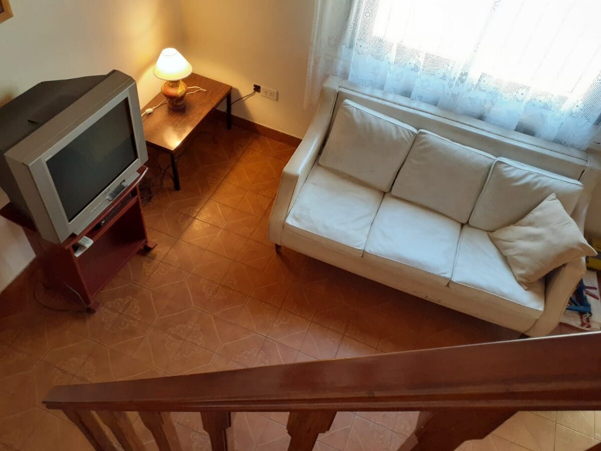 Top performing Airbnb: Warm and Cozy Chalet in Santa Teresita in Santa Teresita