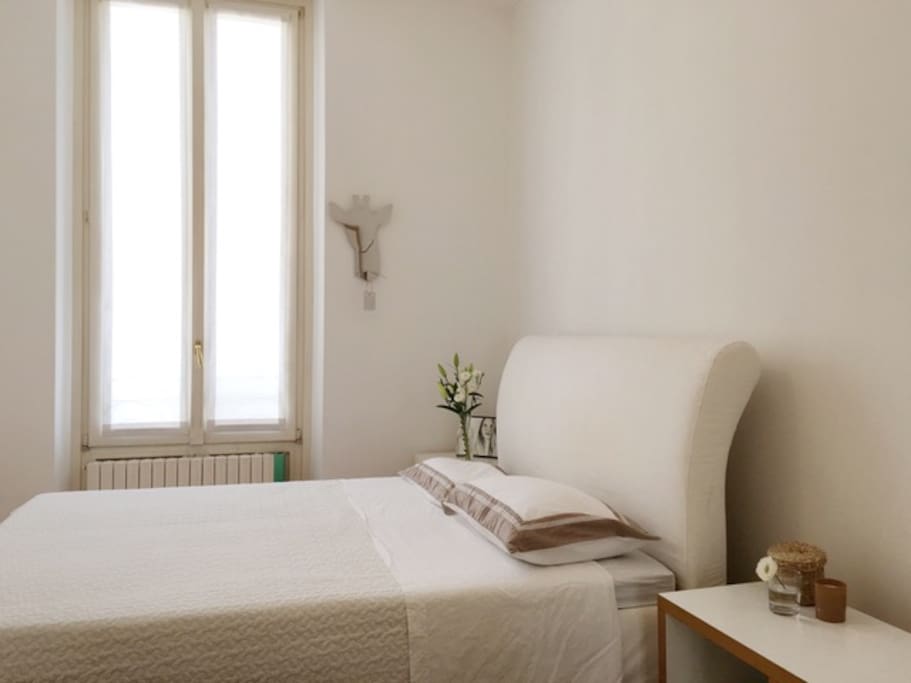 Spacious bedroom | morning sun and looking onto the inner courtyard.