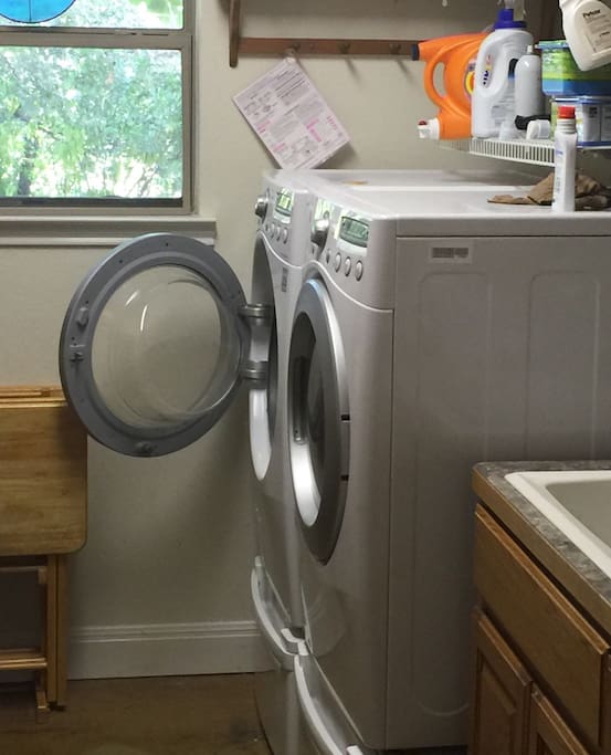 As you enter through your private side entrance, you'll find the Laundry room to the right.....