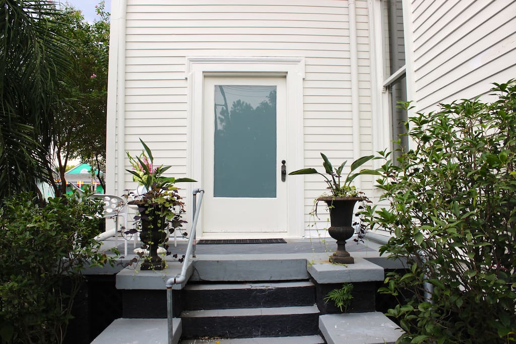 Front door of the studio with petite porch