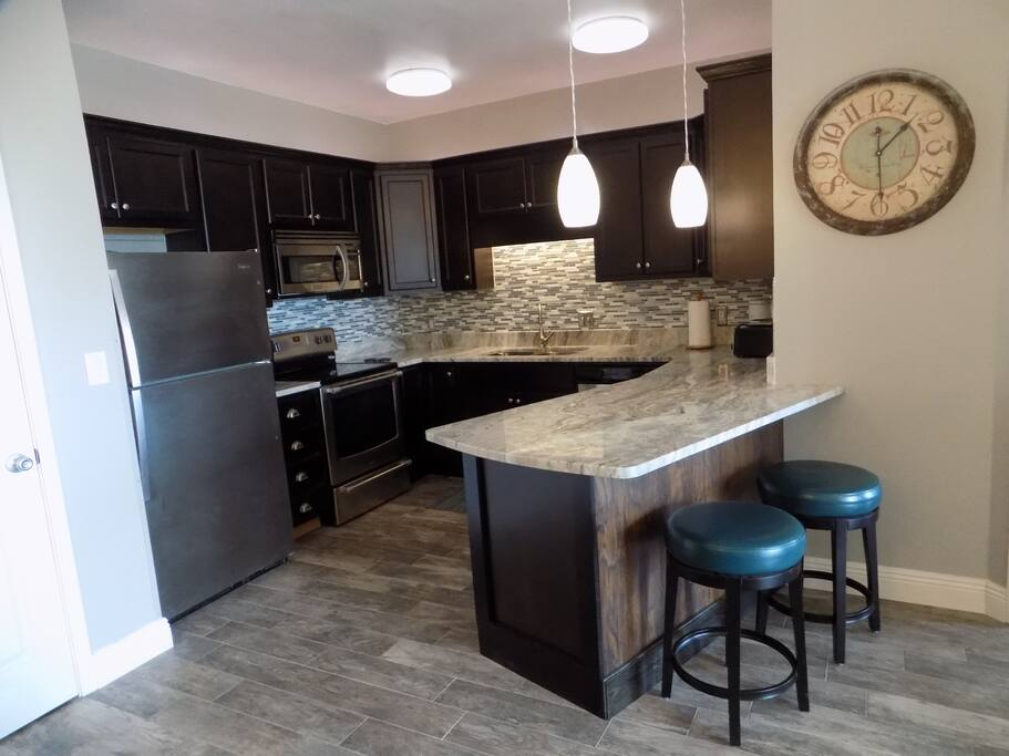 Newly remodeled fully stocked kitchen with keurig for coffee