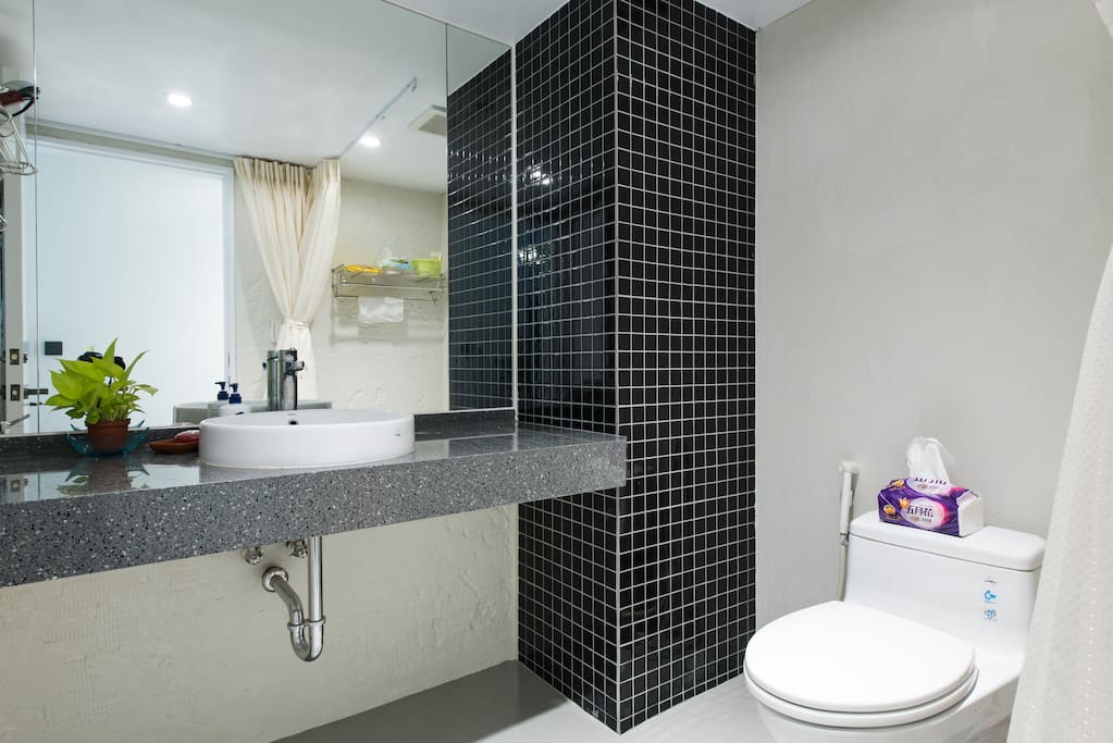 Bright and clean full bathroom with shower.