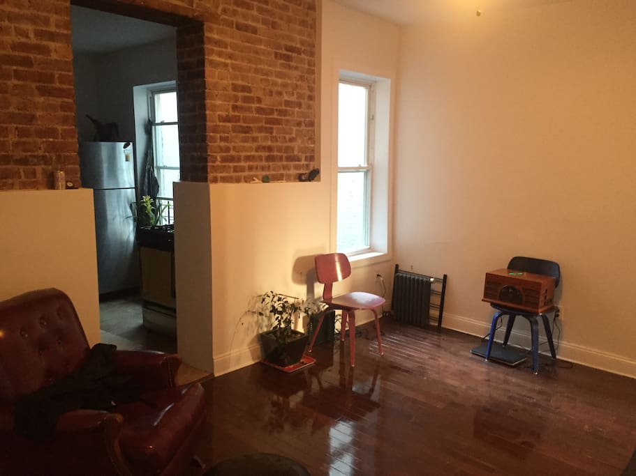 Living Room. Look at that exposed brick. So cozy