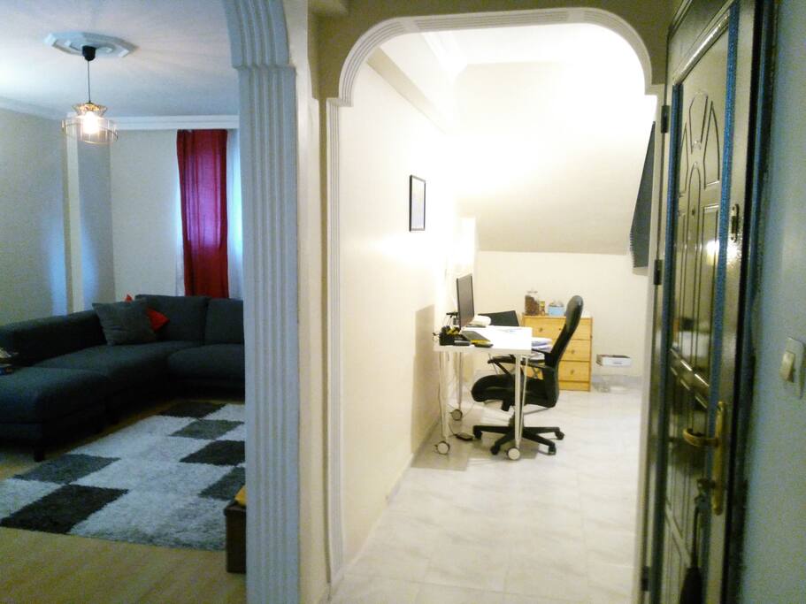 Living Room and Office Desk in the Kitchen (available for guests' use)