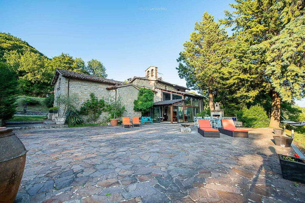 The terrace and new dining room with the Chiesa della Spogna chapel to the left