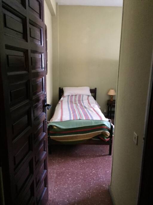 one twin bed and twin bunk beds