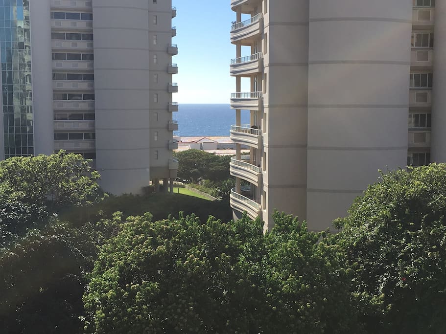 Direct view from the balcony. The Oyster Box Hotel can be seen below with the red roof